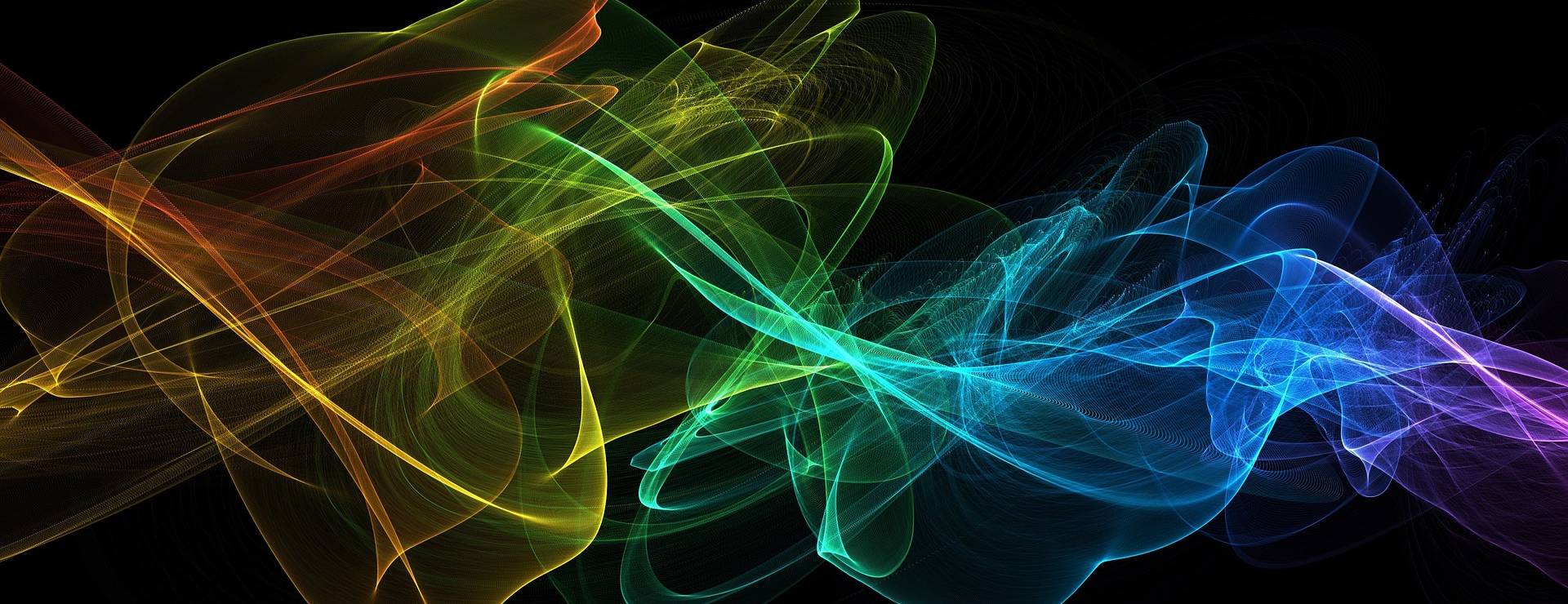 A colorful picture of swirling lights in the dark.